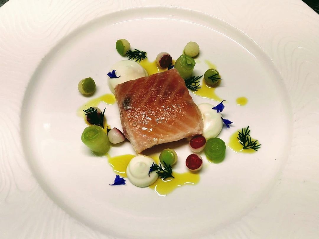 Butter poached Loch Duart salmon, salted crème fraîche, compressed cucumber, pickled apple and radish and dill oil!